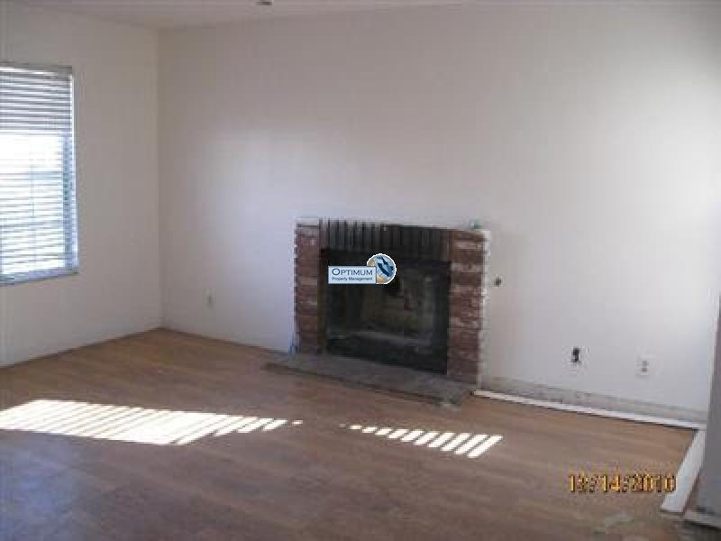 Wood floors and a fireplace on a nice size lot 1