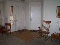 3-bedroom with wood floors and fireplace 14