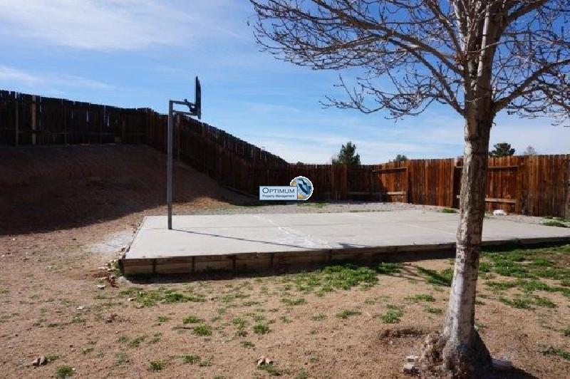Beautiful 4 bed 2 bath fenced backyard & basketball court in victorville 3